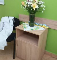 10445